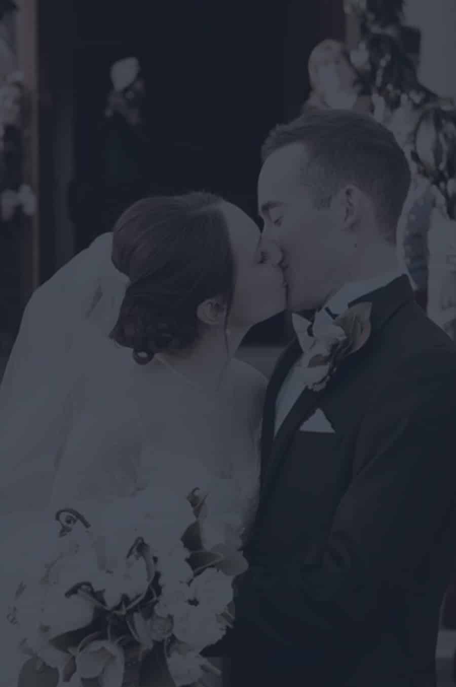 Couple kissing after the perfectly planned wedding by Pop the Bubbly in Charleston SC